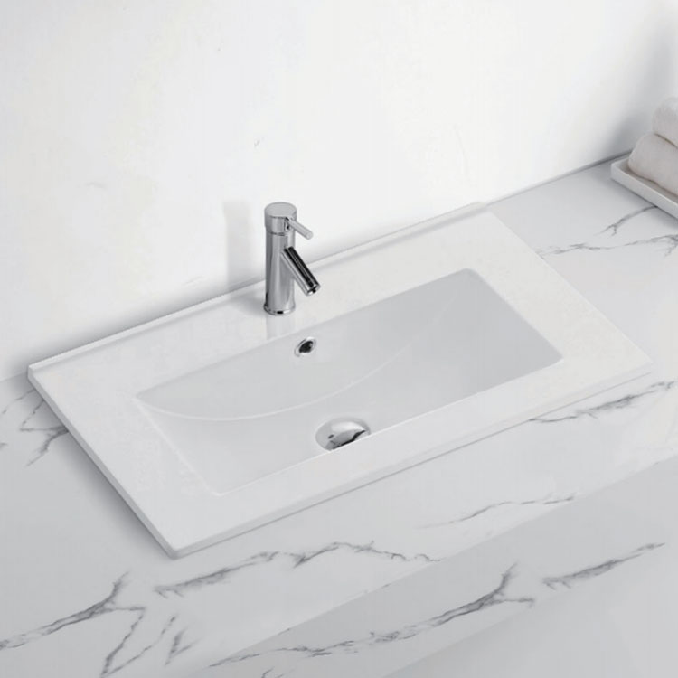 Bagaimana saya boleh membaiki dan mengekalkan calar pada sinki bilik mandi seramik saya?